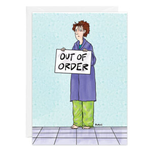A tired person in pajamas and a robe stands barefoot on a tiled floor, holding a sign that says OUT OF ORDER, next to Product 9446.
