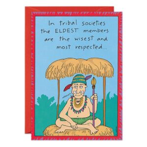 A cartoon of an elderly person under a thatched roof, wearing a feathered headband and necklace, holding a staff. Text: In tribal societies, the eldest members—like on 1159.jpg—are the wisest and most respected.