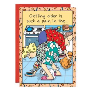 Cartoon of an older couple in the kitchen, both straining to pick up their pets. The Pain In The Birthday Card ("7058.jpg") reads: Getting older is such a pain in the... Confetti border frames the image.