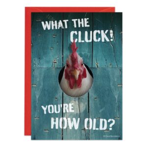 The 9321.jpg Birthday Card shows a chicken peeking through blue boards, with “WHAT THE CLUCK! YOU’RE HOW OLD?” in white text and comes with a red envelope—an amusing way to celebrate any birthday!.