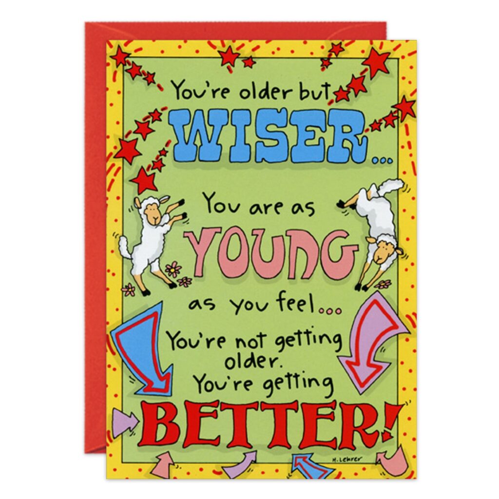 A vibrant birthday card (1317.jpg) with red stars, arrows, and two playful sheep. Features the message: "You’re older but wiser... You are as young as you feel... You’re not getting older. You’re getting better!.
