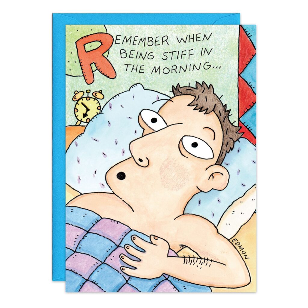 Cartoon from 4735.jpg: A man lies in bed with wide eyes, clutching his blanket. Text above says, "Remember when being stiff in the morning..." Includes an alarm clock and pillow—great for a Stiff Birthday Card!.