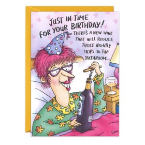 A cartoon woman in pajamas and a party hat sits in bed holding a wine bottle. The 8087.jpg birthday card reads: Just in time for your birthday—there’s a new wine to help reduce those nightly bathroom trips!.