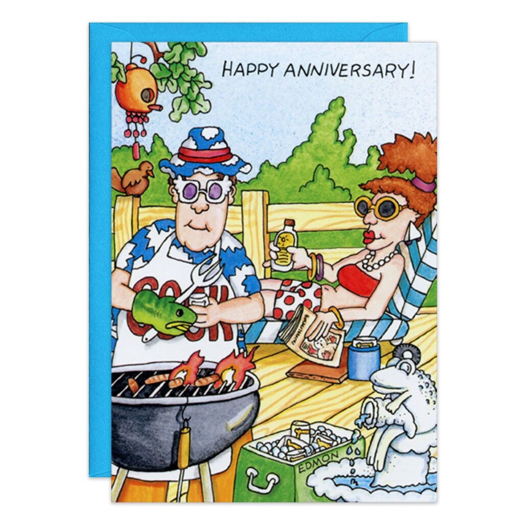 8585.jpg: A cartoon couple celebrates their barbecue anniversary outdoors—he grills fish in a hat and apron, she relaxes with a drink and chips. Nearby are a frog statue and cooler. “Happy Anniversary!” is written above.