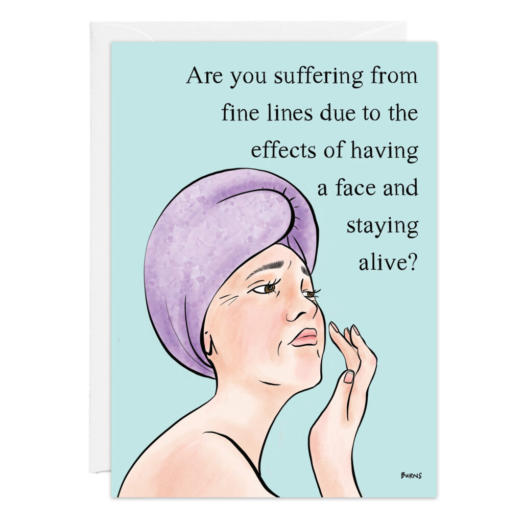 A cartoon woman with a purple towel on her head touches her cheek. Text above: Are fine lines the price of having a face? Perfect for gifting—Fine Lines Birthday Card, Product 9457!.