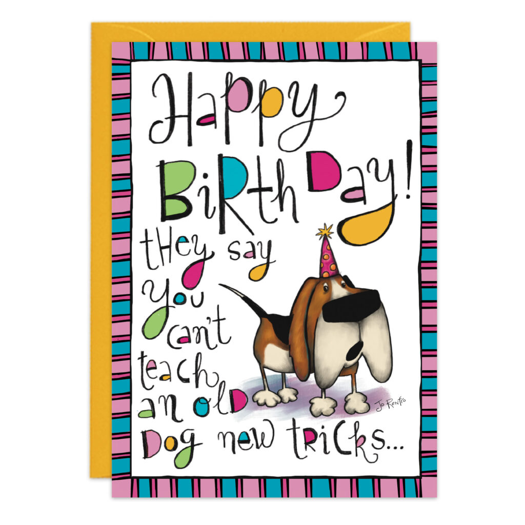 Product 9477: A vibrant birthday card with a cartoon basset hound in a party hat and the message, “Happy Birthday! They say you can’t teach an old dog new tricks...” Features a pink, purple, blue, and black striped border.