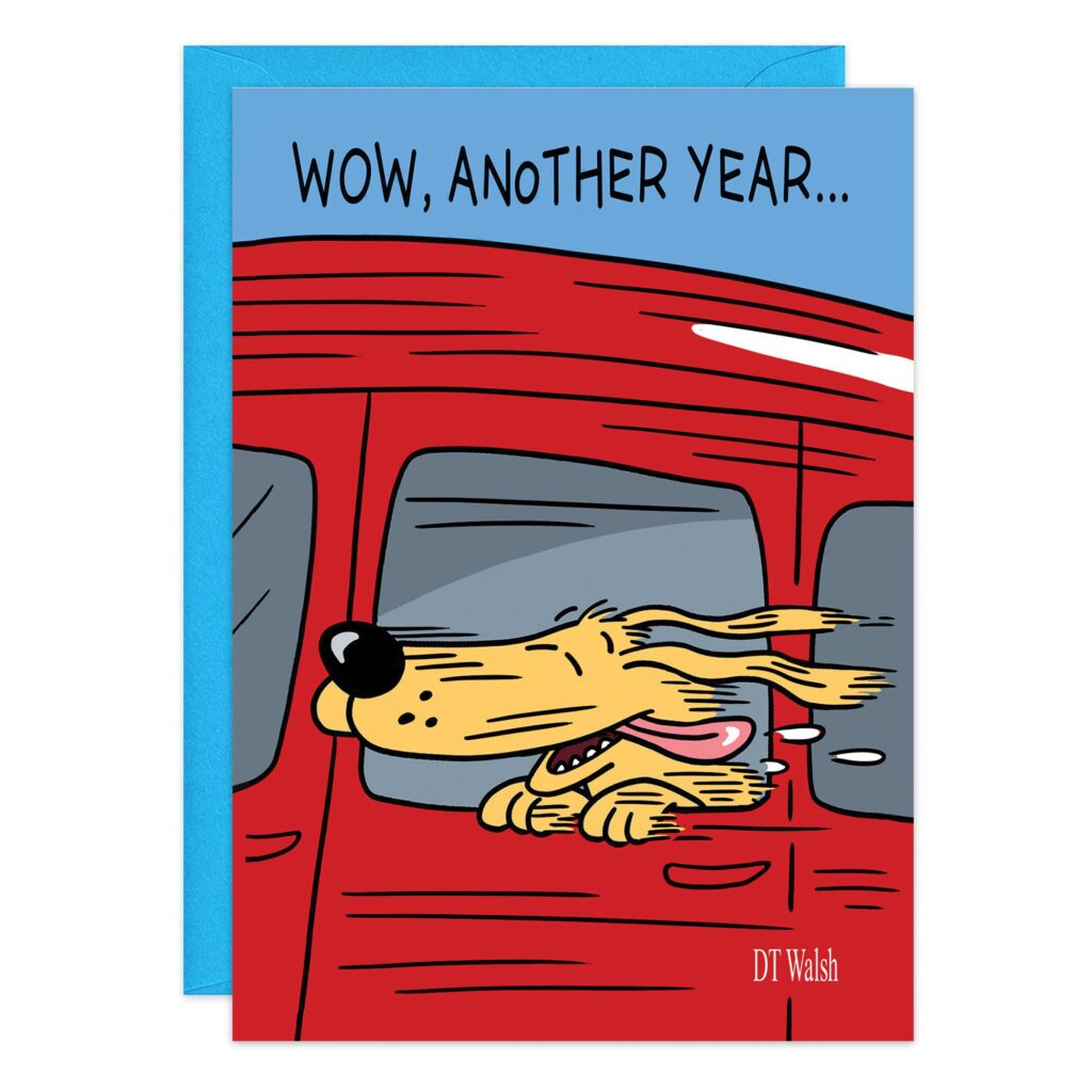 Cartoon dog with tongue out and ears flapping in the wind sticks its head from a red car window. Text above says, "WOW, ANOTHER YEAR..." Blue envelope behind card. Product Name: 9508.