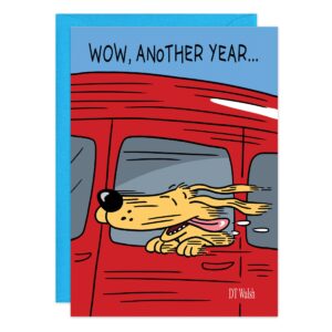 Cartoon dog with tongue out and ears flapping in the wind sticks its head from a red car window. Text above says, "WOW, ANOTHER YEAR..." Blue envelope behind card. Product Name: 9508.